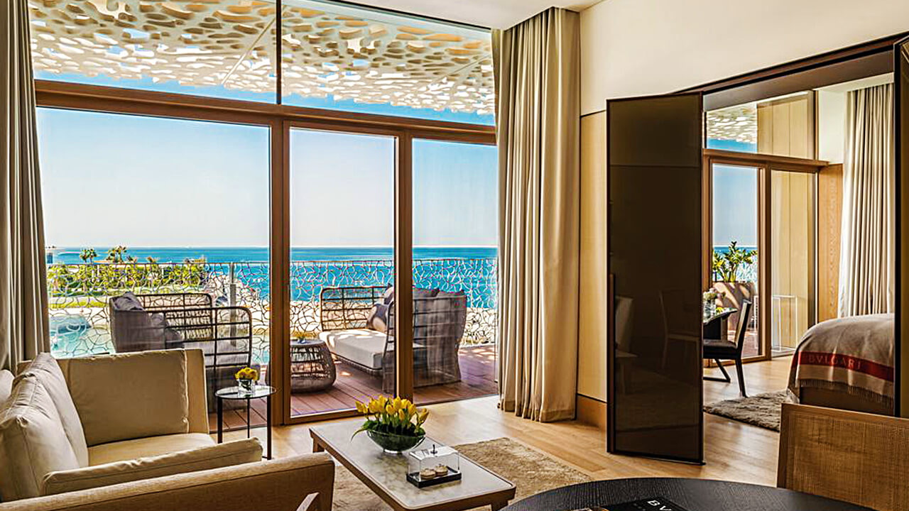 Junior Suite living area with Balcony and Sea View