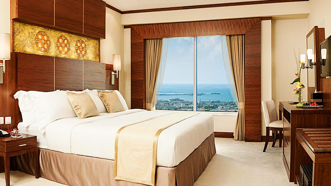 Panoramic King Bed Suite with views of the Arabian Gulf
