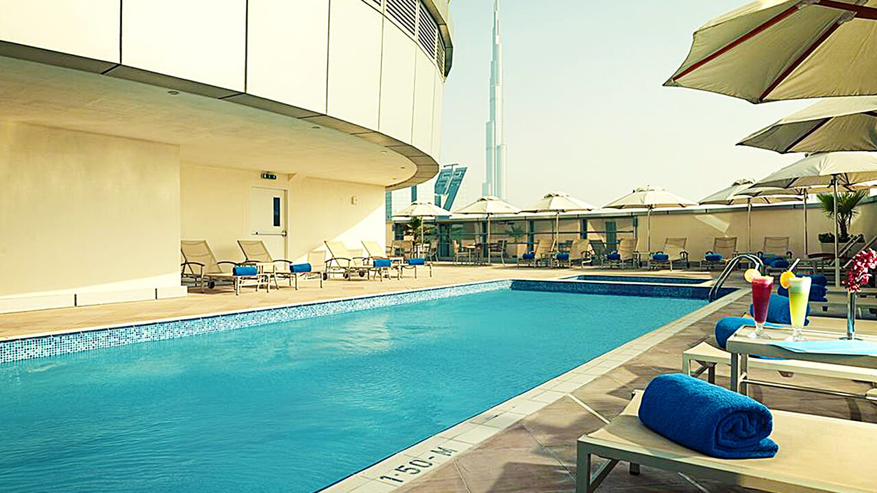 The Pool at the Carlton Downtown Hotel with Burj Khalifa View