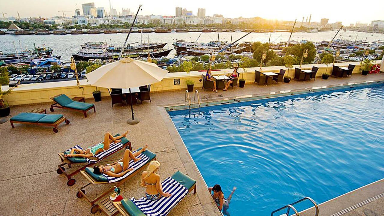La Terrace Pool Lounge with view of the Dubai Creek and Skyline