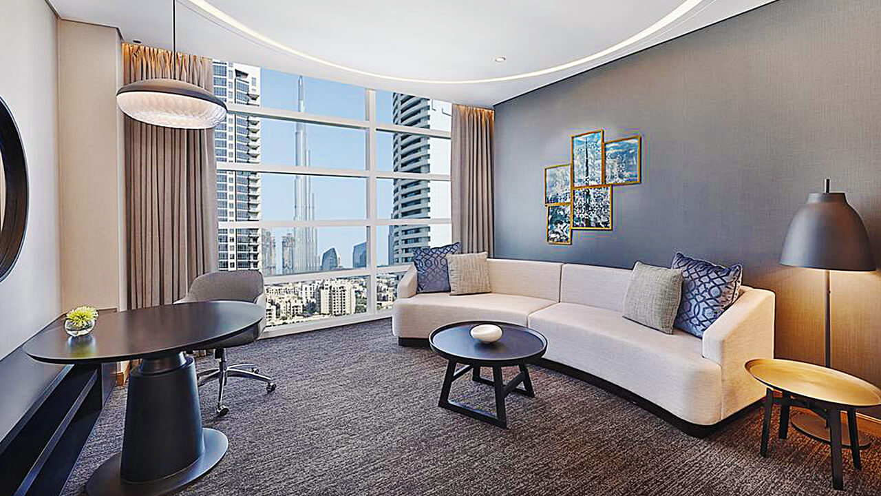 Superior King Guest Room living area with Burj Khalifa View