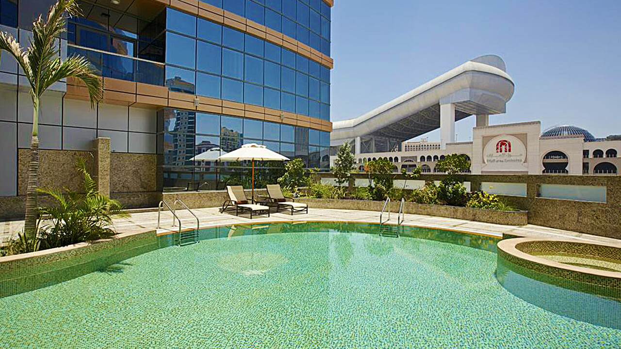 Outdoor Swimming Pool view with Mall of the Emirates