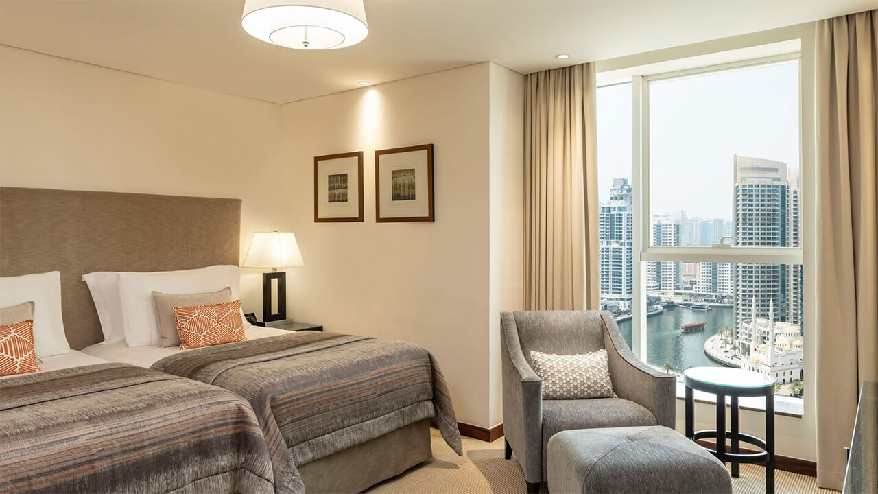 Deluxe Twin Suite Bedroom with city view