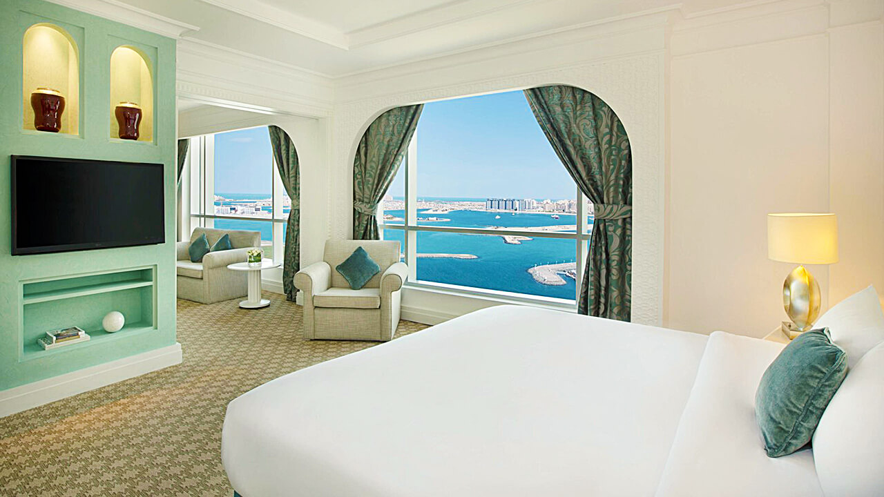Club King Bed Suite With Partial Sea View
