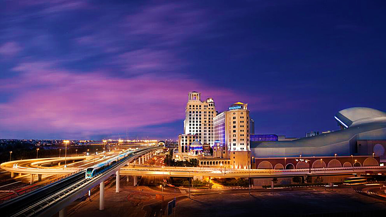 kempinski hotel dubai Exterior Night view with Dubai Metro