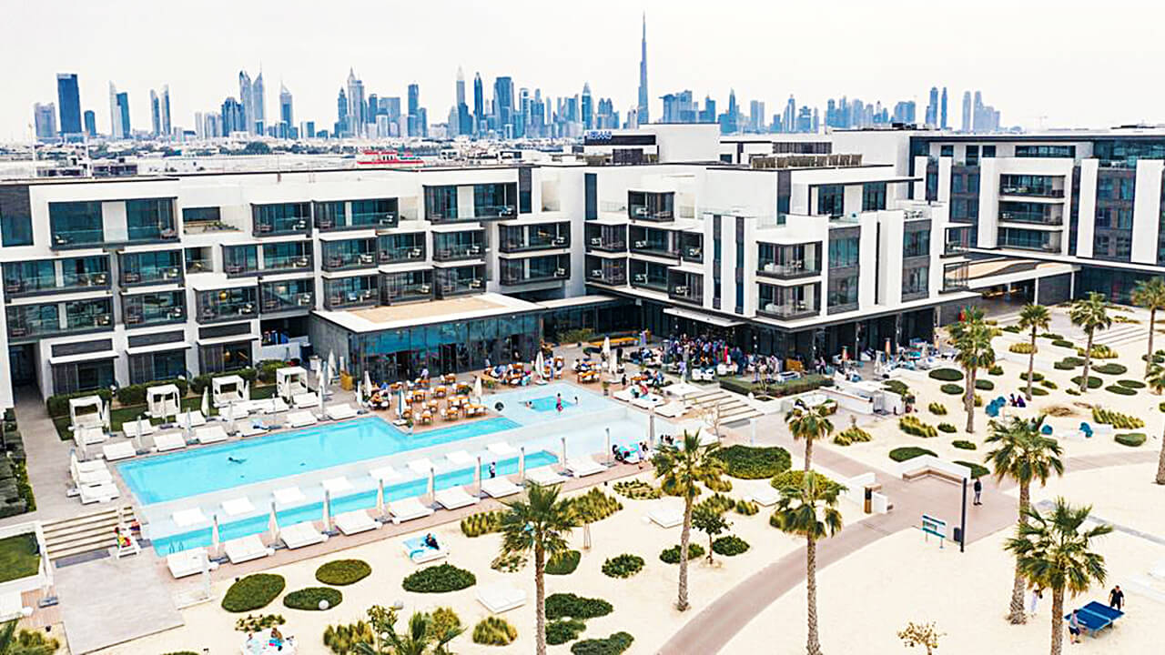 Aerial View of Resort with pool and city view